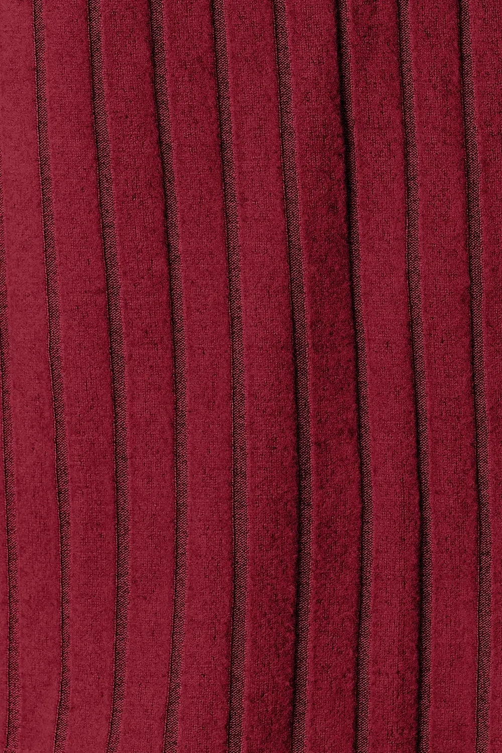 Close-up of red ribbed knit fabric with vertical stripes, apparel textile texture