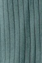 Close-up of soft teal ribbed knit fabric, showing textured vertical stripes