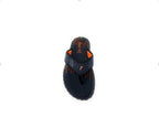Navy blue and orange men's flip flop sandal with textured sole on white background