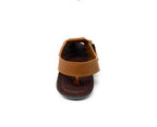 Single brown open-toe sandal with adjustable strap on white background