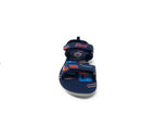 Navy blue kids' sandal with red and blue accents, velcro straps, sporty design
