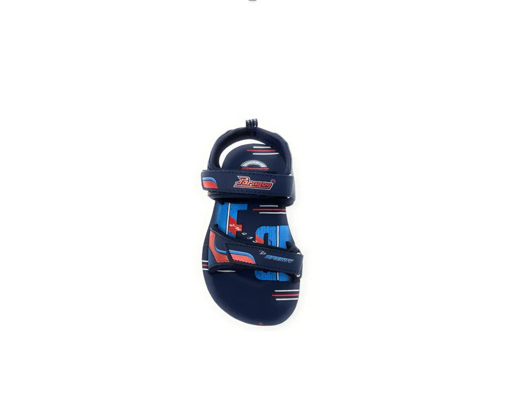 Navy blue kids sandal with red and blue accents, velcro straps, and sporty design