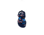 Navy blue kids sandal with red and blue accents, velcro straps, and sporty design