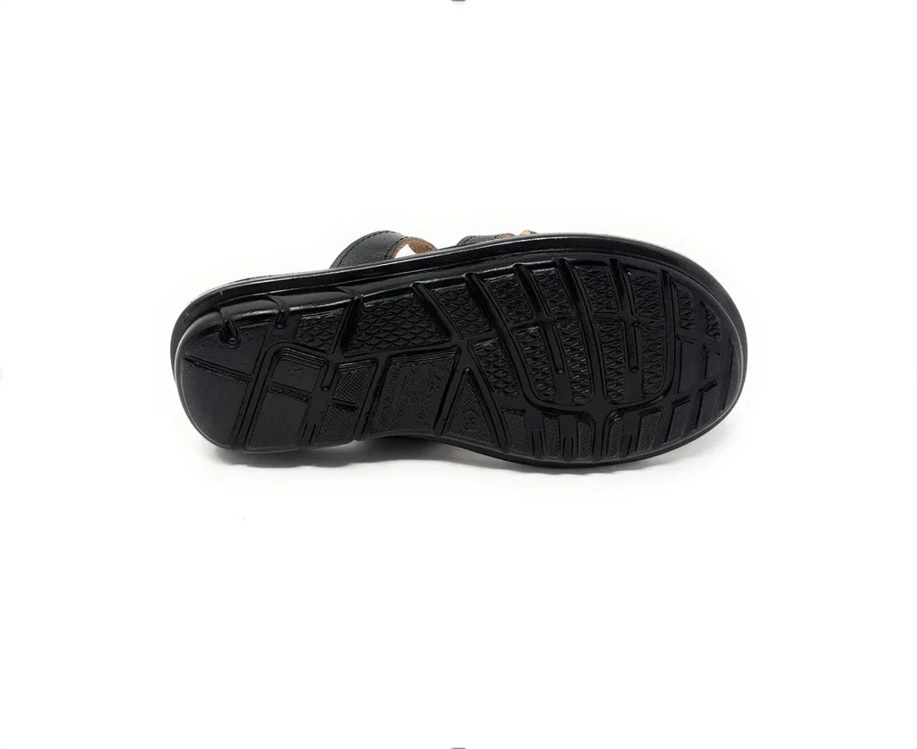 Black sandal sole with textured grip pattern on white background