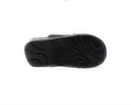 Black shoe with textured non-slip sole, isolated on a white background