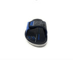 Navy blue slide sandal with 'One Step High' text, arrow graphics, and white sole on white background