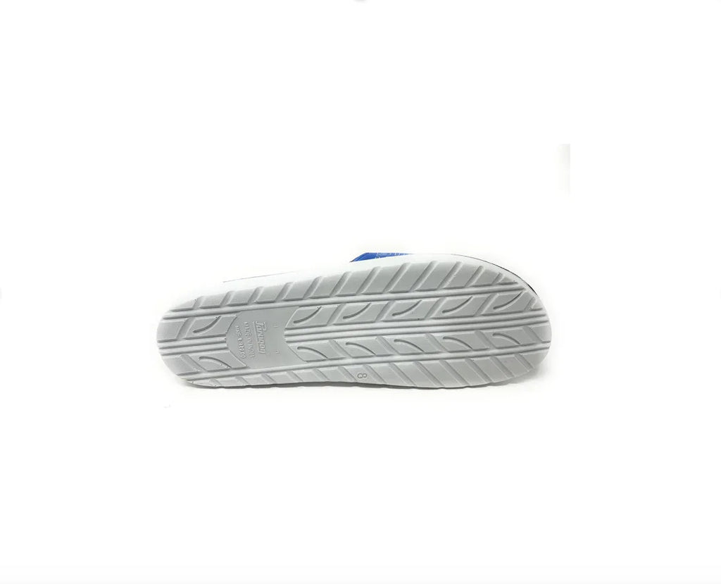 White athletic shoe sole with textured rubber tread, isolated on white background