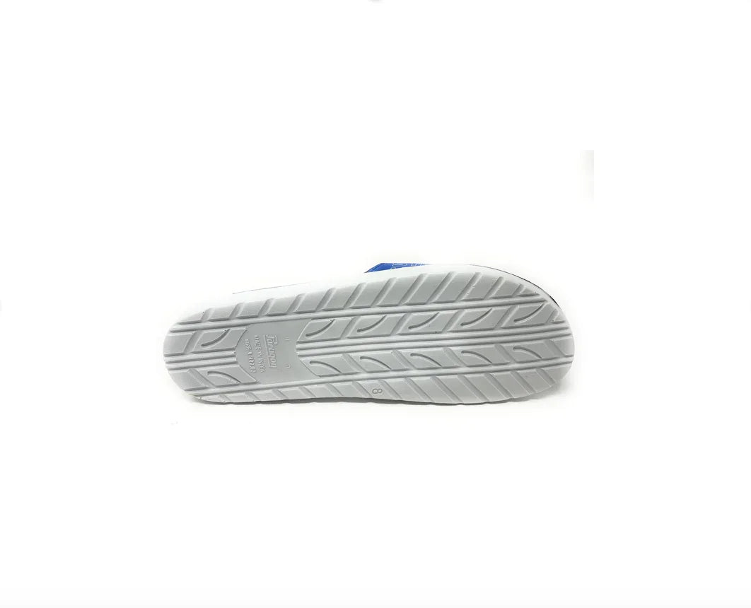 White athletic shoe sole with textured rubber tread, isolated on white background