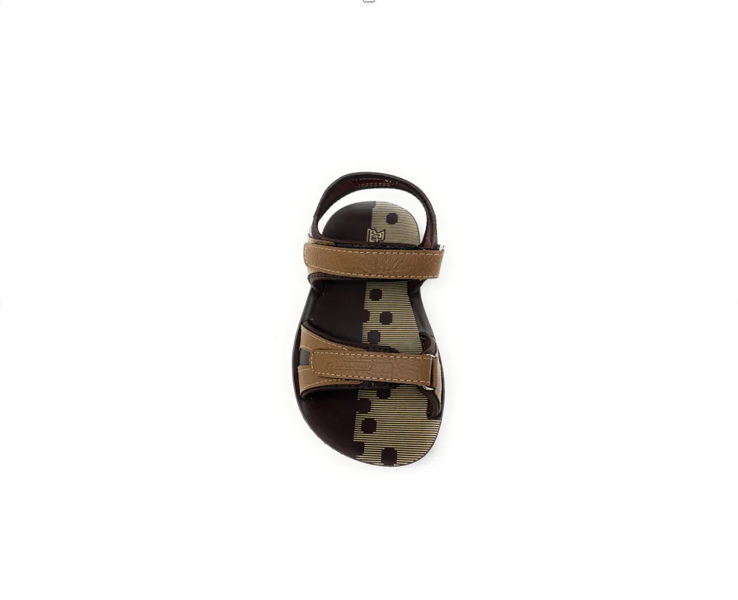 Brown open-toe sandal with adjustable straps and a polka dot footbed, top view