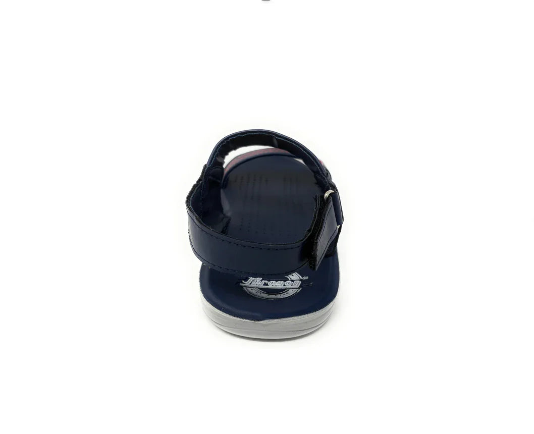 Navy blue children’s sandal with ankle strap, viewed from the back on white background