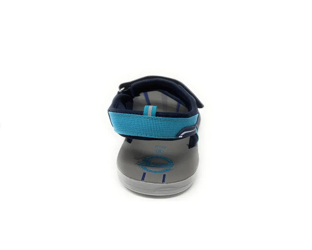 Back view of a blue and gray kids' sandal with adjustable strap on white background