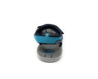Back view of a blue and gray kids' sandal with adjustable strap on white background