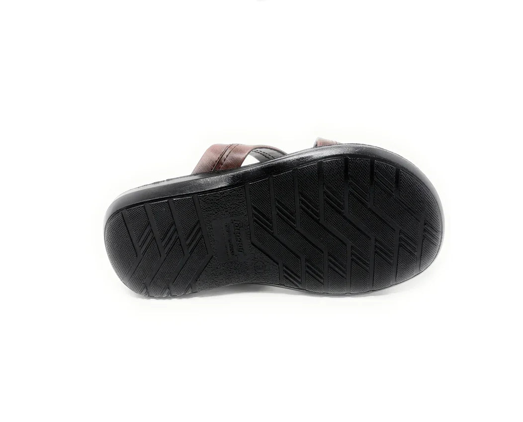 Bottom view of a men's brown sandal with a textured black sole