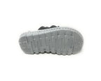 Gray rubber shoe sole with textured tread pattern, isolated on white background
