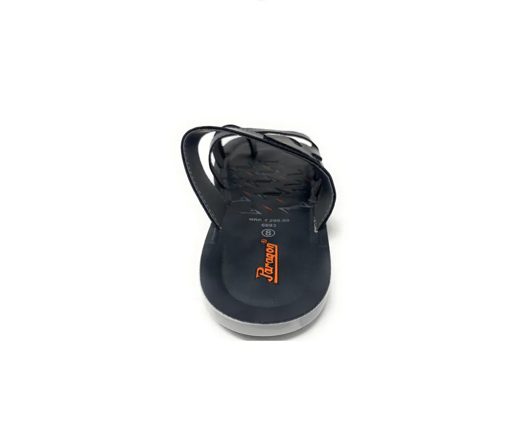 Black slip-on sandal with thin straps and textured sole, casual footwear on white background