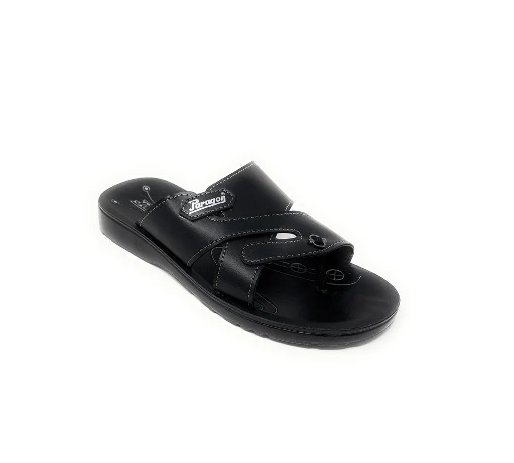 Black men's slip-on sandal with adjustable strap and cushioned sole, studio background