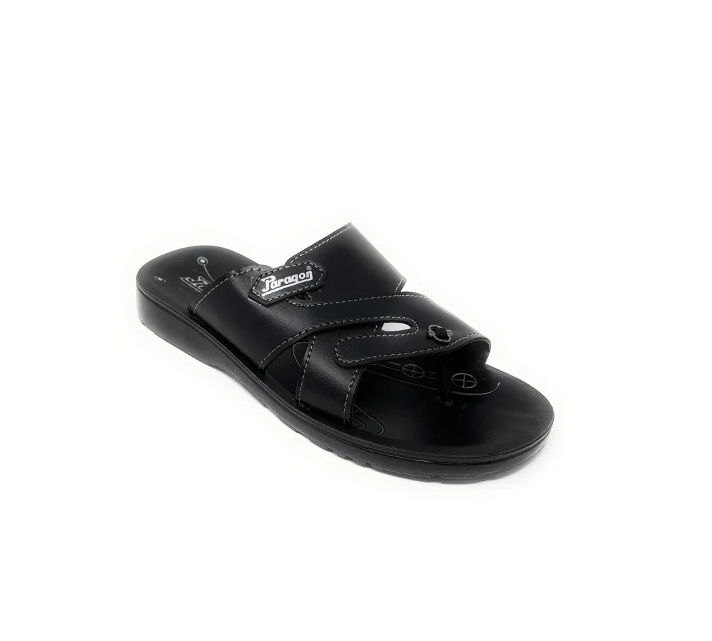 Black men's slip-on sandal with adjustable strap and cushioned sole, studio background