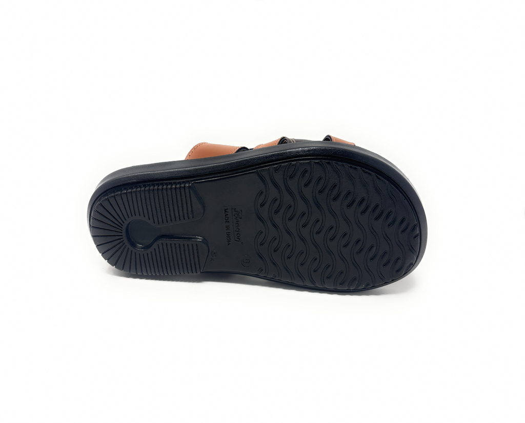 Black rubber sandal sole with tread pattern and brown straps, footwear product photo