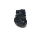 Front view of a black leather sandal with adjustable straps on a white background.