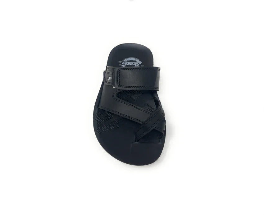 Black slip-on sandal with adjustable strap and textured footbed on white background