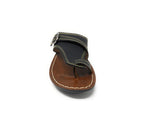 Brown and black leather sandal with buckle and contrast stitching on white background