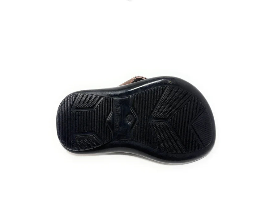 Non-slip black rubber sandal sole with tread pattern, isolated on white background