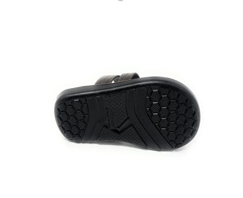Black sandal with non-slip rubber sole and hexagonal tread pattern on white background