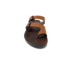 Brown leather sandal with double buckle straps and black sole, front view on white background