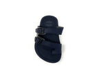Navy blue slide sandal with two adjustable buckle straps, flat sole on white background