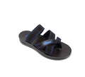 Black and blue strap sandal with Velcro closure on white background