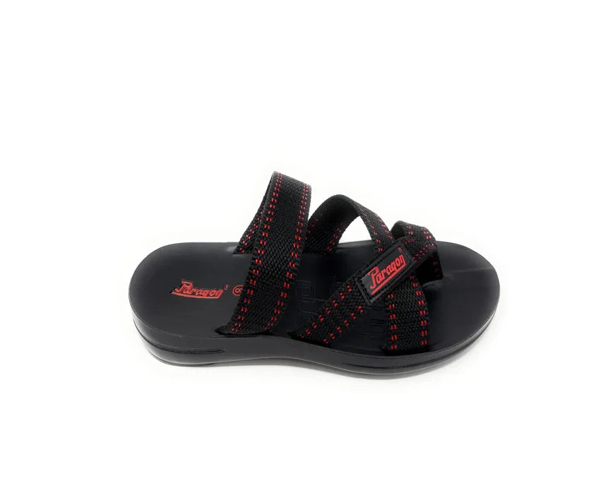 Black and red open-toe slip-on sandal with crisscross straps on a white background