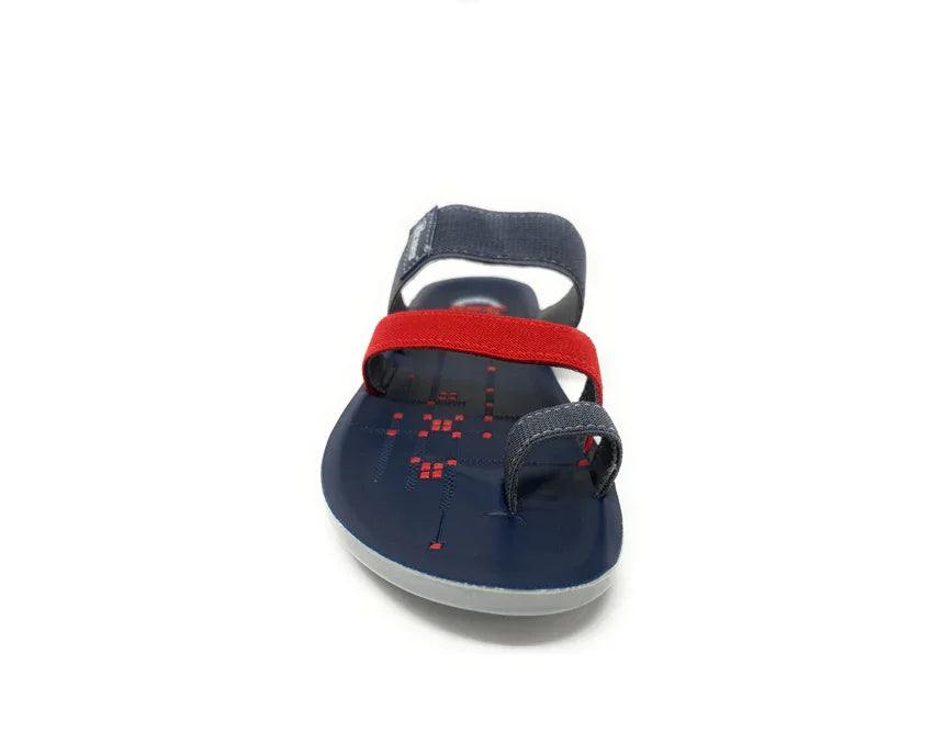 Navy blue sandal with red and blue straps, open toe, and geometric print footbed