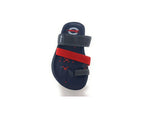 Navy blue sandal with red and gray velcro straps, geometric pattern on footbed