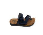 Navy blue slip-on sandal with buckle and tan footbed for casual summer wear