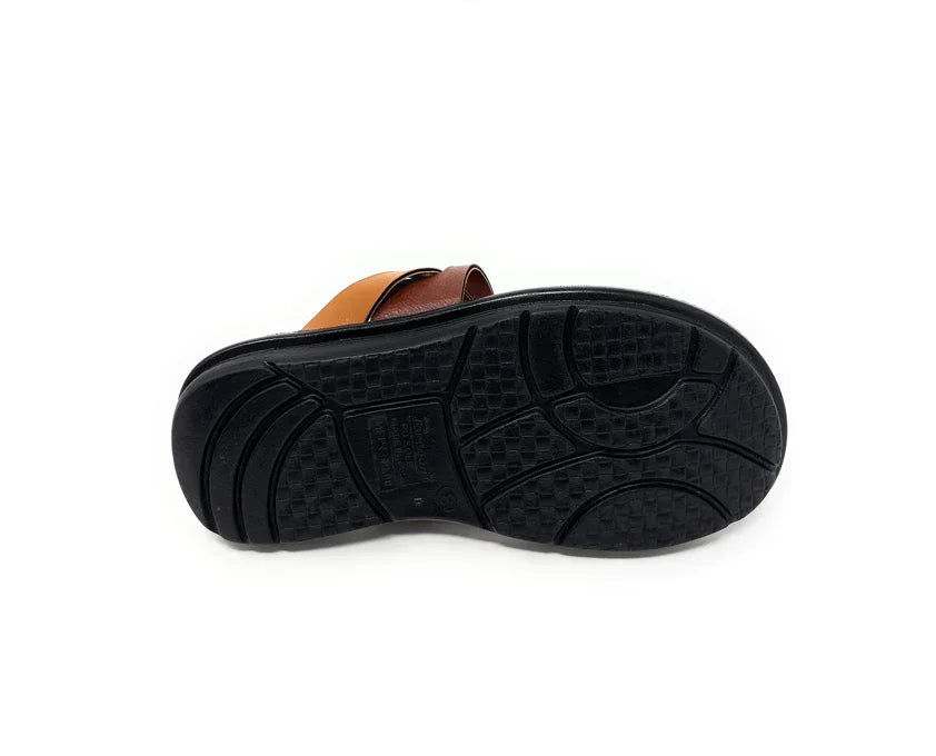 Black rubber sole of a brown sandal with textured grip, isolated on white background.